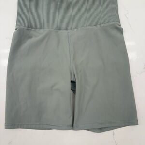 Vuori High-Rise Bike Shorts in Sage Green